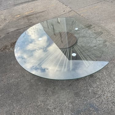 One of a kind round glass coffee table. 47x14" tall
