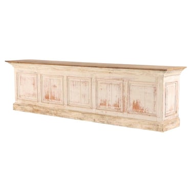 A French partially painted oak store counter, C. 1890.