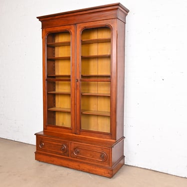 Antique Victorian Carved Walnut Glass Front Bookcase Cabinet, Circa 1880s