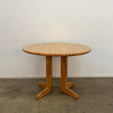 Solid round restored parquet dining table 