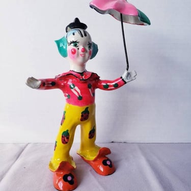 Paper mache Clown holding umbrella 