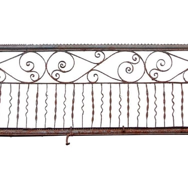 Wrought Iron Balcony with Scrolling Details & Iron Banister