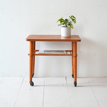 Vintage 1950s Scandinavian Mahogany Coffee Table with Black Legs and Wheels 