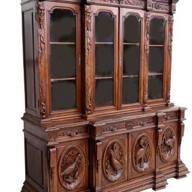 FRENCH HIGHLY-CARVED OAK BREAKFRONT BOOKCASE