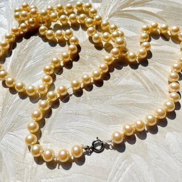 Long Knotted Champagne Pearls