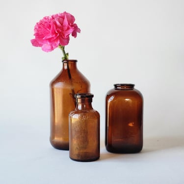 Vintage amber bottles set of three Lysol tobacco 