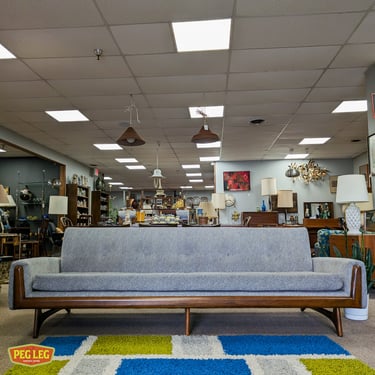 Mid-Century Modern sofa with walnut details