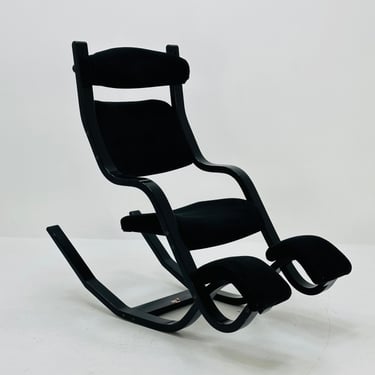 Mid century black fabric Gravity” rocking  Lounge chair by Peter Opsvik for Stokke, 1980s 