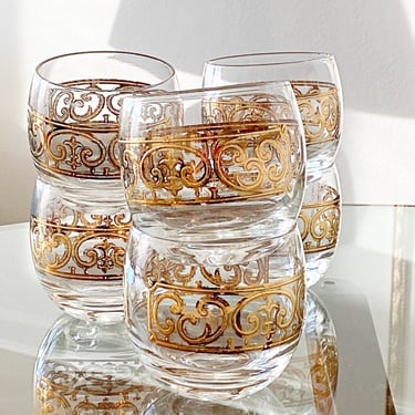 4  Roly poly rocks cocktail glasses. Georges Briard embossed Spanish Gold scroll glassware, Glam mid century whiskey bar glasses. 