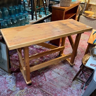 Work bench on wheels. 56” x21” x 34.5” 