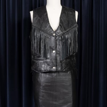 1980s Black Leather Fringe Patchwork Vest with Lace Up Sides by Navarre Leather Company 