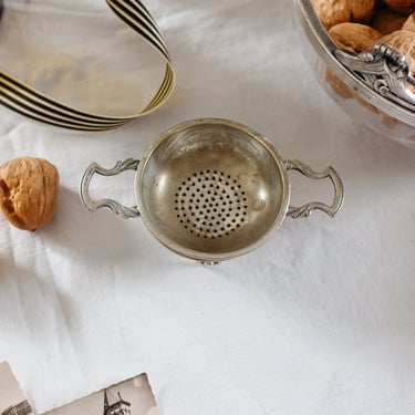 vintage English silver tea strainer with bowl