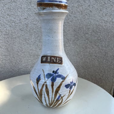 Vintage bohemian stoneware pottery wine beige decanter with blue floral print size 11” x 5” 