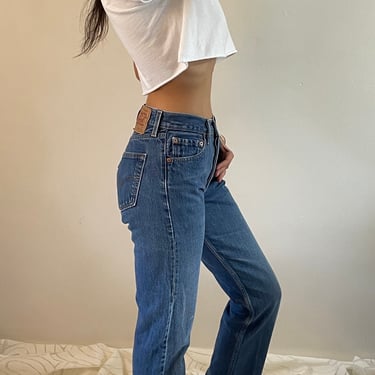27 Levis 501 jeans / vintage high waisted faded medium wash boyfriend button fly for women tall Levis 501 jeans made USA | small size 27 