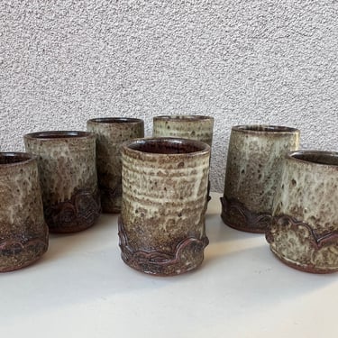 Vintage bohemian studio art pottery browns cups set of 7 signed 
