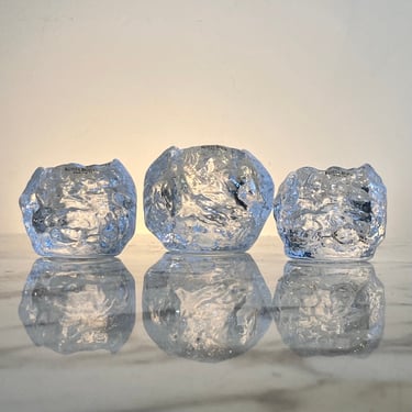 Set of three Kosta Boda “snowball” candleholders 