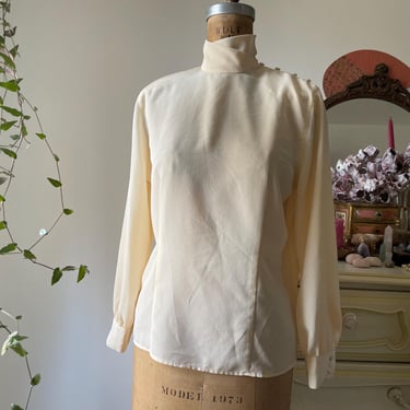 Vintage ‘80s ‘90s Jones New York Petites cream silky blouse, high wraparound collar, shoulder buttons, S 