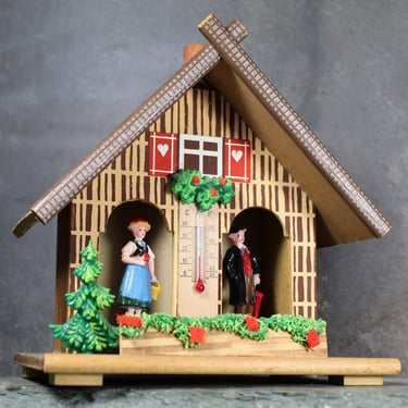 Toggili Thermometer | West German Chalet with Thermometer | Adjustable Man and Lady in Folk Costumes | Missing one Decor Piece 