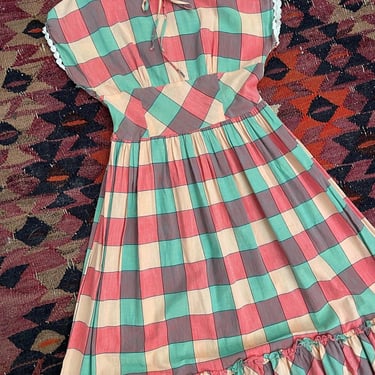 1940s/50s cotton dress with scalloped trim, an accentuated waistline, and original mends, pink and mint green 