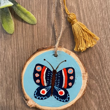 Folk Art Butterfly Ornament/ Blue, Red and Gold Boho Christmas Decoration with Tassel/ Hand Painted Wood Slice Holiday Tree Decor 