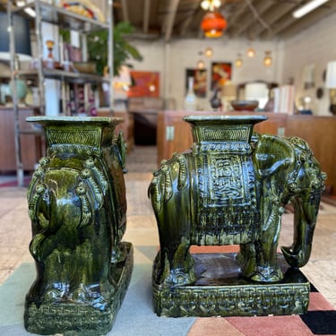 Vintage Glazed Ceramic Elephant Garden Stools/Plant StandsSome minor chipped paint at the bottom of each elephant.