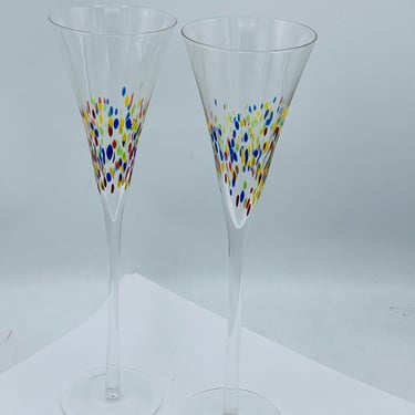 11” tall  Long stemmed pair of champagne glasses  Hand blown with colorful confetti speckles 