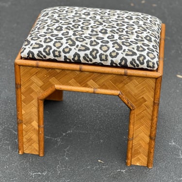 Great vintage rattan stool with new leopard fabric. 