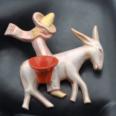 1930's colored celluloid man on donkey brooch, early plastic sombrero wearing rider with basket pin 