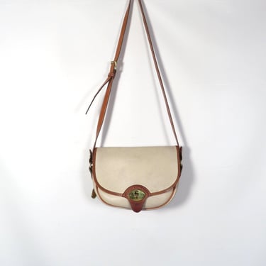 Vintage 90s Dooney And Bourke All Weather Cream Pebble Leather Saddle Bag 