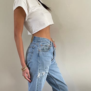 80s Levis 501 faded jeans / vintage light wash faded soft worn patched high waisted button fly Levis 501 jeans | 29 x 33 