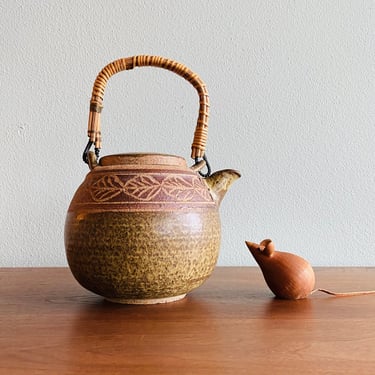 Vintage studio pottery teapot with leaf pattern 