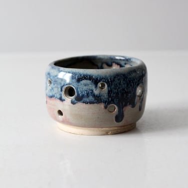 vintage studio pottery bowl with cutout design 