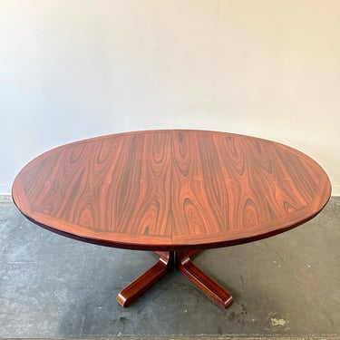 Danish Rosewood MCM round dining table with leaf 