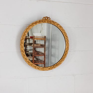 vintage Italian plaster mirror with bow cornice