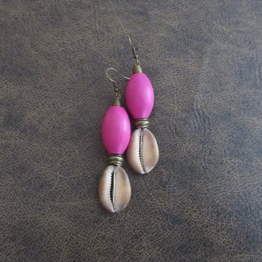 Cowrie shell earrings, long wooden earrings, African Afrocentric earrings, seashell earrings, exotic ethnic earrings, hot pink earrings 