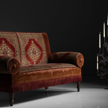 Red Velvet & Carpet Sofa / Wrought Iron Candelabra