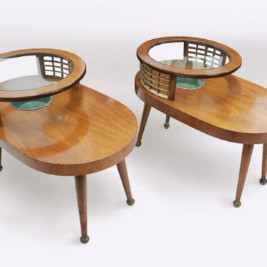 Gilbert Rohde style oval pair of end tables with brass details | 