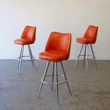 Mid-Century Modern Orange Vinyl & Chrome Swivel Bar Stools — Set of 3 