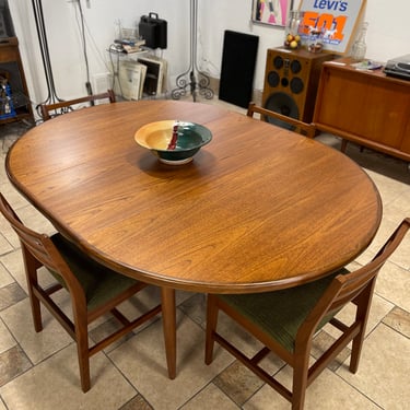 Mid Century Teak Round to Oval Dining Table Designed by Victor Wilkins for GPlan