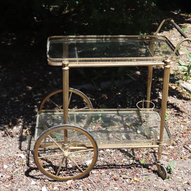 vintage french tiered brass bar cart with oversized wheels