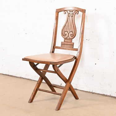 Antique Arts & Crafts Carved Oak Lyre Back Folding Chair by Phoenix Chair Co., Circa 1920s