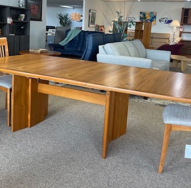 Dining Table<br />Ansager Mobler<br />Two Self Storing Leaves (19.75″ each)<br />Teak Veneer<br />L 71-90.75-110.5 x W 43 x H 29