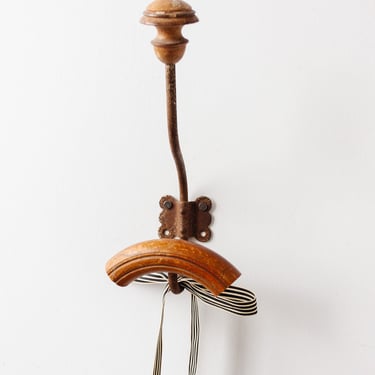 1930s French cast iron and wood coat hook