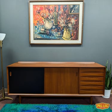 Danish Modern teak credenza with reversible doors by Arne Vodder for Sibast