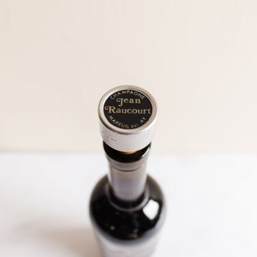 vintage French “Jean Raucourt” bottle stopper