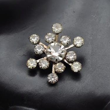 Atomic 60's rhinestone silver tone snowflake brooch, tine set crystals mid-century bling pin 