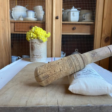 Rustic old French wooden  pestle with imperfections 