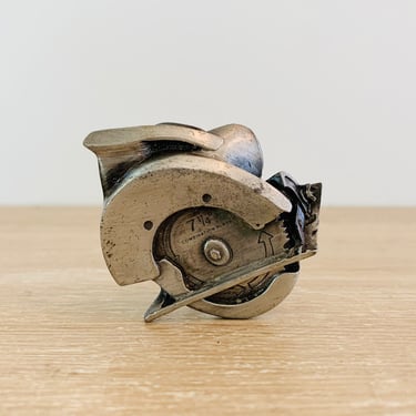 Vintage Circular Saw Metal Belt Buckle by Bergamot Brass Works Model E 12 circa 1979 