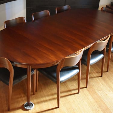 Extra-long restored Niels Moller Brazilian Rosewood dining set (round-to-oval expandable table, eight 71 chairs) - 105.75” 