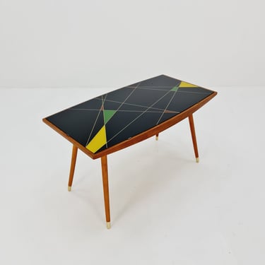 mid century vintage coffee table with glass top from the 50s 